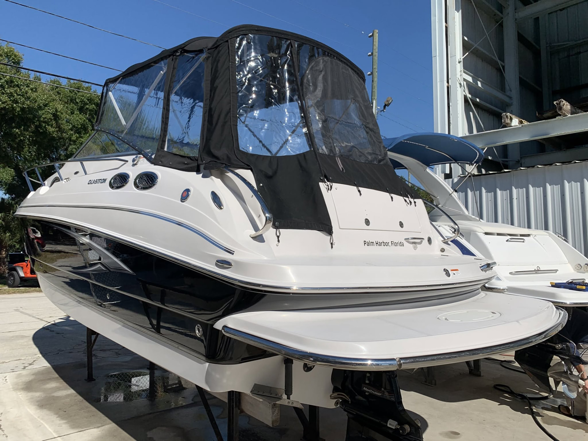 Finished express cruiser after detailing with its full canvas enclosure up