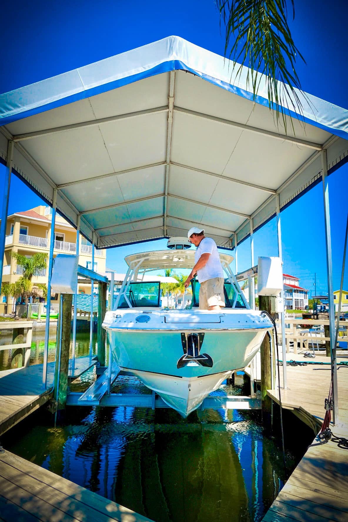 Mobile yacht detailing service in progress dockside
